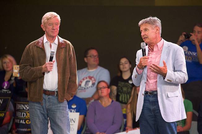 Libertarian Party candidate for president Gary Johnson, right, a former New Mexico governor, and vice-presidential candidate William Weld, former governor of Massachusetts, answer questions from the audience during a campaign stop at The Foundry nightclub in the SLS Las Vegas Thursday, Aug. 18, 2016.