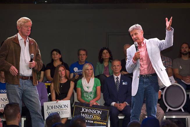 Libertarian Party candidate for president Gary Johnson, right, a former New Mexico governor, and vice-presidential candidate William Weld, former governor of Massachusetts, answer questions from the audience during a campaign stop at The Foundry nightclub in the SLS Las Vegas Thursday, Aug. 18, 2016.