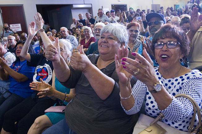 Supporters cheer Democratic vice presidential candidate Tim Kaine speaks to supporters during a rally at the United Association Local 525 Plumbers and Pipefitters Training Center in Las Vegas Monday, Aug. 22, 2016.