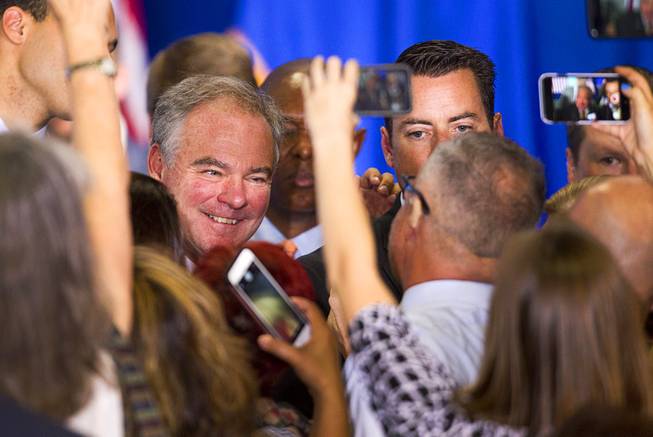 Democratic vice presidential candidate Tim Kaine greets supporters during a rally at the United Association Local 525 Plumbers and Pipefitters Training Center in Las Vegas Monday, Aug. 22, 2016.