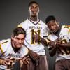 Members of the Bonanza High football team pose for a photo at the Las Vegas Sun's high school football media day July 20, 2016 at the South Point. They include, from left, Ammon Montenegro, R.J. McCarter, and Child Dore.