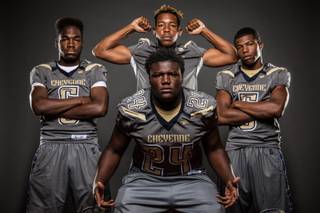 Members of the Cheyenne High football team pose for a photo at the Las Vegas Sun's high school football media day July 20, 2016 at the South Point. They include, from left, Corwin Bush, William Federson, John Tarver, and Deriontae Green.