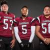 Members of the Desert Oasis High football team pose for a photo at the Las Vegas Sun's high school football media day July 20, 2016 at the South Point. They include, from left, Brandon Smith, Brannon Flowers, and Desmond Kuresa.