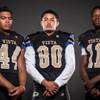 Members of the Sierra Vista High football team pose for a photo at the Las Vegas Sun's high school football media day July 20, 2016 at the South Point. They include, from left, Lopaka Kolone, Chevy Eliu, and Damaen Bentley.