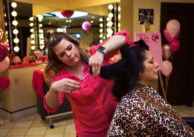 The Rio Spa & Salon stylist Ashley Birk cuts the hair of customer Maria Gonzalez as the shop hosts its Seventh annual Cut-A-Thon to benefit Locks of Love on Wednesday, August 24, 2016. The program runs all year and simply takes an appointment there to start the process.  L.E. Baskow.