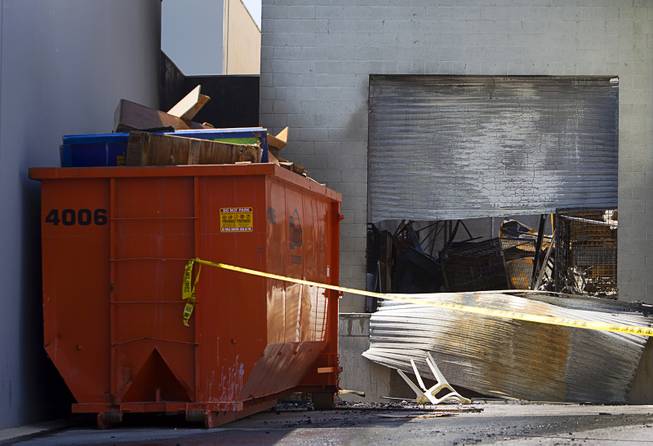 Damage to a loading dock is shown after an early morning fire gutted a warehouse at 4343 Polaris Ave. near West Harmon Avenue Thursday, Aug. 25, 2016. The fire destroyed school supplies and a clothing donation center run by Peoples Autism Foundation. The charity aids children with autism and their families.