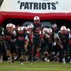 The Liberty football team enter the field through their giant helmet as they face Arbor View during their season opener on Friday, August 26, 2016.