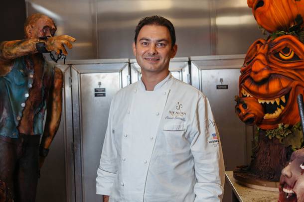 Executive Pastry Chef Claude Escamilla stands next to some Halloween showpieces in the kitchen at Jean Philippe Patisserie inside the Aria on Aug. 26, 2016.