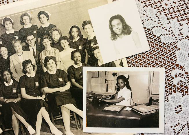 Old photos kept by Mae Wiggins from her Queens College days and on the job as a nurse are seen Aug. 24 at her home in Virginia Beach, Va. Wiggins says that in 1963, she and a friend were both turned away from a Queens borough apartment complex owned by the Trumps. “We were both professional people with good credit ratings,” Wiggins recalled. “No reason to be denied apartments in a location that we thought was desirable and nice.”