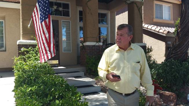 Rep. Cresent Hardy visits homes in Las Vegas to talk to voters July 20, 2016.