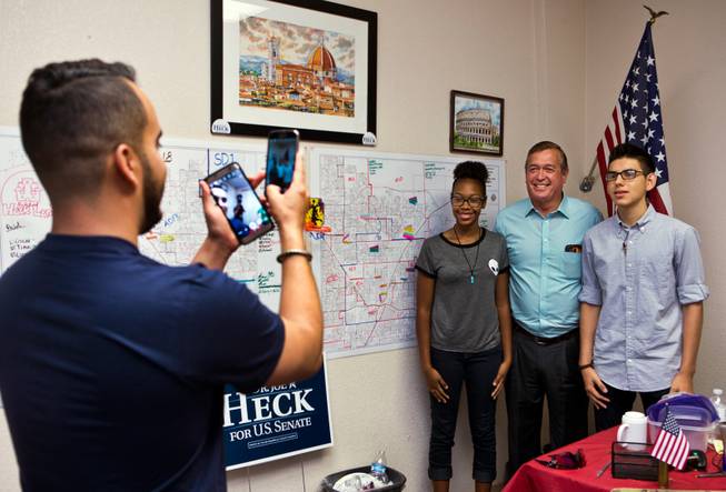 Republican Rep. Cresent Hardy joins new political volunteers in a photo during a stop over at a local campaign office on Saturday, August 27, 2016.