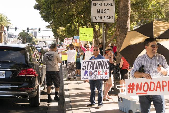 Protestors line up along Las Vegas Blvd during the "We Stand with Standing Rock" protest in support of the Standing Rock Sioux tribe, in front of the Bellagio Casino, Friday, Sept. 9, 2016. The Standing Rock Sioux tribe is fighting to stop the Dakota Access Pipeline (DAPL) from passing through their lands in North Dakota, which they say will contaminate the water and violate sacred grounds.