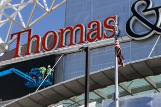Construction crew work on the exterior of Thomas and Mack Center on September 16, 2016.  .