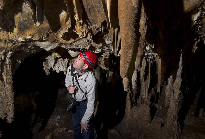 UNLV Geoscience professor Matthew Lachniet looks over formations in the Lehman Caves in the Great Basin National Park Thursday, Sept. 15, 2016.
