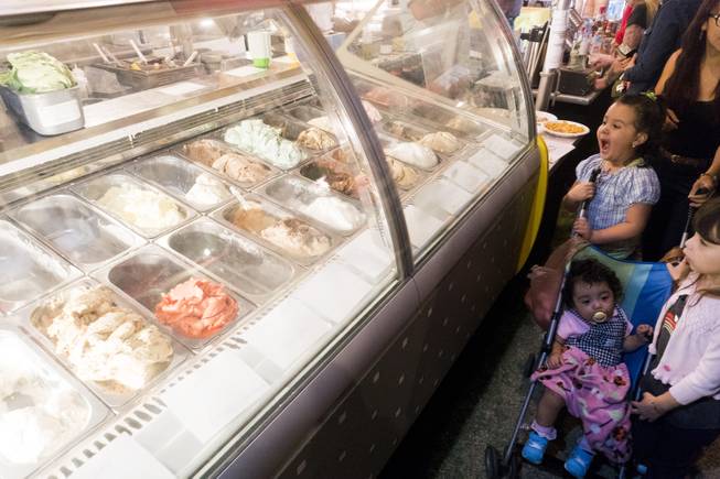 Children stare at the assortment of gelato treats during the 37th Annual San Gennaro Feast Festival at Craig Ranch Park in North Las Vegas, Friday, Sept. 16, 2016.