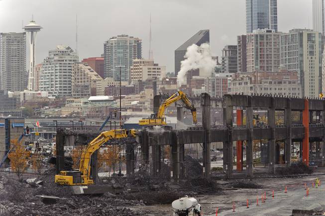 A view of State Route 99 Alaskan Way Viaduct south end demolition, November 2011. Crews demolish the last 1,100 feet of the viaduct south of Seattle's King Street. 