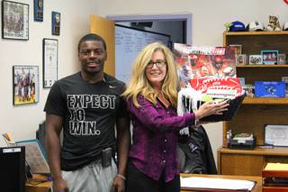 UNLV football player Tim Hough returned to Desert Pines High Monday, Sept. 19, 2016, to visit Kristine Korth, his former counselor. Players nationwide such as Hough are making trips to their high school this week to celebrate the teacher or educator who made the most difference in their lives through the Extra Yard for Teachers program.