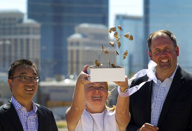 Alison Burk, development director for the Fore Property Company, releases Painted Lady butterflies during a groundbreaking ceremony for a luxury apartment complex on Spring Mountain Road near Chinatown Monday, Sept. 26, 2016. With Burk is Pete Tran, left, Fore Property development financial analyst, and Jonathan Fore, Fore Property vice president. The 295-unit complex is being developed by the Fore Property Company in partnership with Argosy Real Estate Partners. 