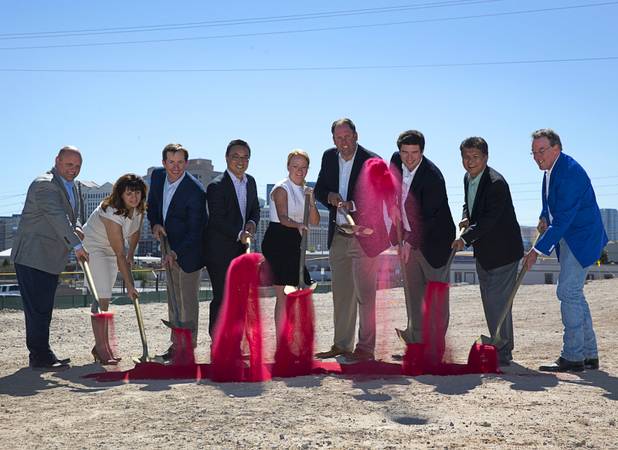 Executives shovel red sand during a groundbreaking ceremony for a luxury apartment complex on Spring Mountain Road near Chinatown Monday, Sept. 26, 2016. The 295-unit complex is being developed by the Fore Property Company in partnership with Argosy Real Estate Partners.  From left: Nathan Long, Cheryl Colbus, Dave Butler, Pete Tran, Alison Burk, Jonathan Fore, Bryan Antwan,Tom Nitta, and Brit Perkins.