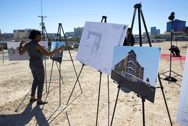 Artist illustrations are displayed during a groundbreaking ceremony for a luxury apartment complex on Spring Mountain Road near Chinatown Monday, Sept. 26, 2016. The 295-unit complex is being developed by the Fore Property Company in partnership with Argosy Real Estate Partners. 
