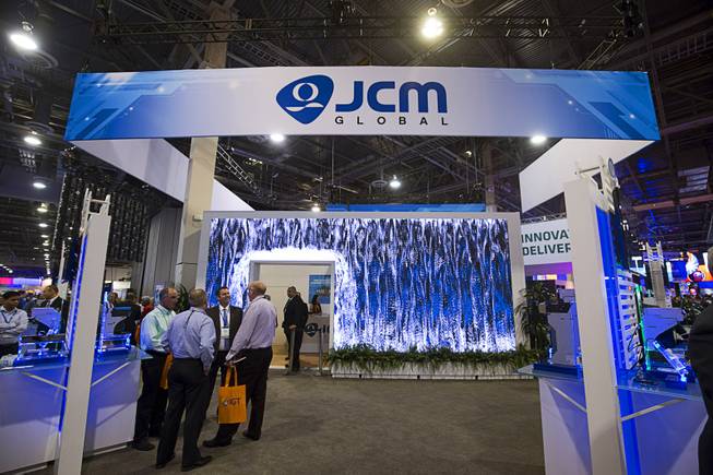 The JCM Global booth is shown during the Global Gaming Expo (G2E) convention at the Sands Expo and Convention Center Tuesday, Sept. 27, 2016.