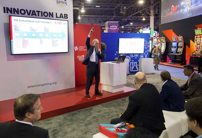 Mark Yoseloff, executive director of the Center for Gaming Innovation at UNLV, speaks at the Innovation Lab booth during the Global Gaming Expo (G2E) convention at the Sands Expo and Convention Center Wednesday, Sept. 28, 2016.