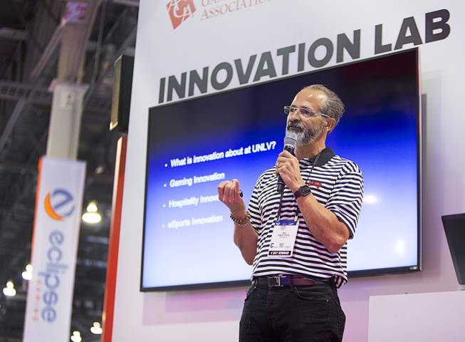 Robert Rippee, director of the Hosptality Innovation Lab and eSports Lab at UNLV, speaks at the Innovation Lab booth during the Global Gaming Expo (G2E) convention at the Sands Expo and Convention Center Wednesday, Sept. 28, 2016.