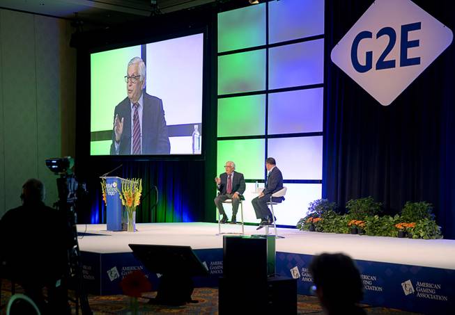 Former NBA Commissioner David Stern, left, speaks during the Global Gaming Expo (G2E) convention at the Sands Expo and Convention Center Thursday, Sept. 29, 2016. American Gaming Association's President and CEO Geoff Freeman listens at right.