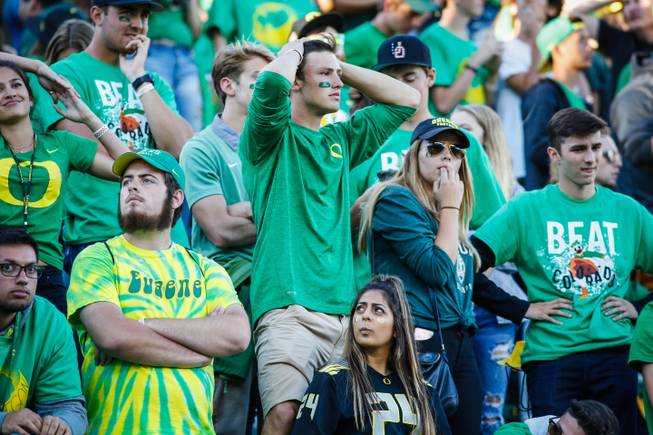 In this Sept. 24, 2016 file photo, Oregon fans react to the last second interception that sealed their loss against Colorado in an NCAA college football game in Eugene, Ore. Veteran Oregon players addressed their teammates on a practice field on Monday, Sept. 26, 2016, two days after the Ducks’ 41-38 loss at home to Colorado.