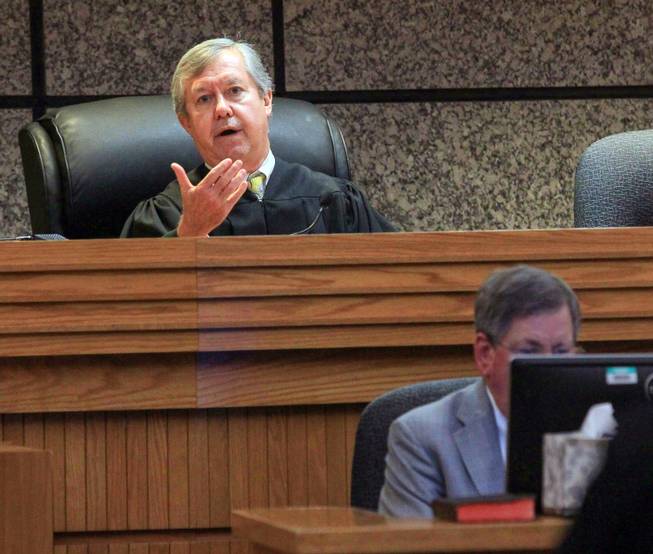 Judge Edgar Long presides over a hearing of a 14-year old, who was charged as a juvenile Friday, Sept. 30, 2016 in Anderson, S.C., with murder and three counts of attempted murder after authorities say he killed his father and opened fire on students at a playground, wounding three people. The Associated Press typically does not identify juveniles charged with crimes.