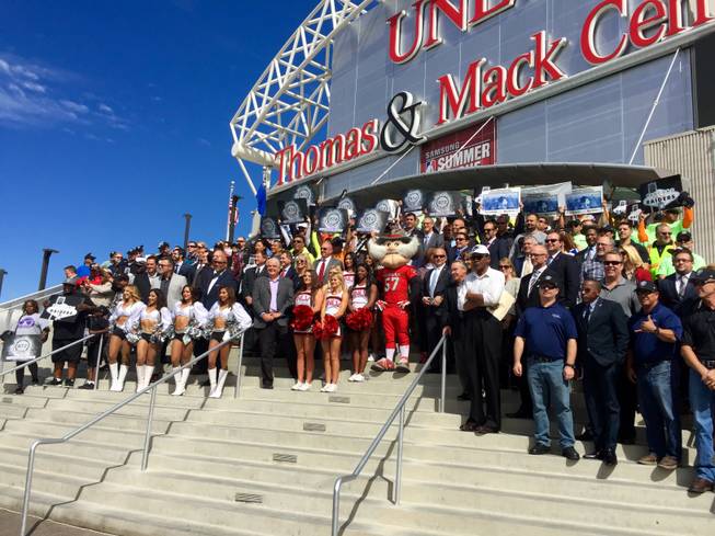 Supporters of the stadium project, originally pitched by the Las Vegas Sands Corp., line the steps of UNLV's Thomas & Mack Center on Monday, Oct. 3, 2016. Stadium backers organized a news conference to make another public pitch for the project, which is headed to the Nevada Legislature for consideration.