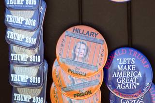 Buttons are displayed by a vendor before a rally featuring Republican presidential nominee Donald Trump at the Henderson Pavilion in Henderson Wednesday, Oct. 5, 2016.