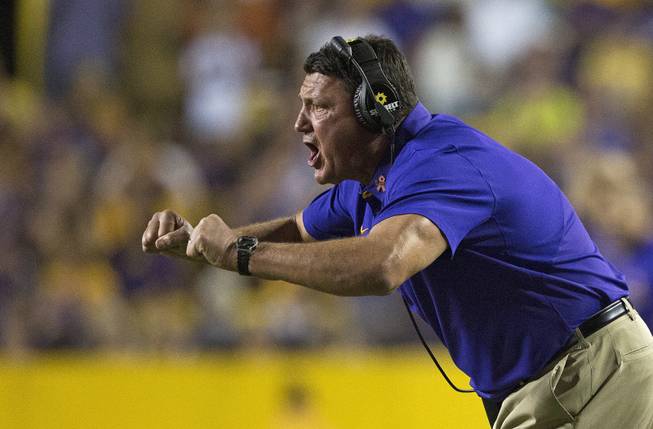 LSU interim coach Ed Orgeron yells directions during the second half of the team's NCAA college football game against Missouri in Baton Rouge, La., Saturday, Oct. 1, 2016. LSU won 42-7. 