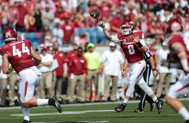 Arkansas  quarterback Austin Allen passes to  tight end Austin Cantrell during the first quarter of an NCAA football game against Alcorn State, Saturday, Oct. 1, 2016, in Little Rock, Ark. 