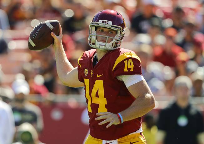 Southern California quarterback Sam Darnold throws a pass during the first half of Saturday's game in Los Angeles.