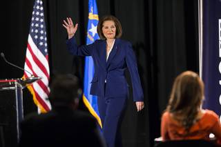 Democratic U.S. Senate candidate Catherine Cortez Masto takes the stage during the Nevada Senatorial Debate at Canyon Springs High School on Friday, Oct. 14, 2016, in North Las Vegas. The debate between Cortez Masto and U.S. Rep. Joe Heck, R-Nev., was televised statewide.