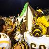 The Bonanza High football team celebrates after its 20-14 win over Spring Valley in the Banner Game, Friday, Oct. 14, 2016.