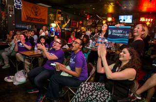 Candidate supports gather at the Dive Bar to watch and cheer them on during the final 2016 Presidential Debate happing nearby on campus at UNLV on Wednesday, Oct. 19, 2016.