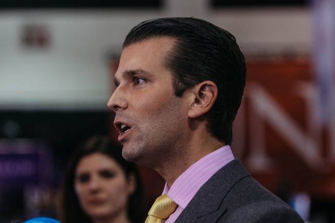 Donald Trump Jr. speaks with media inside the spin room at Thomas and Mack Center in Las Vegas, Nev. after the third presidential debate on Oct. 17, 2016.