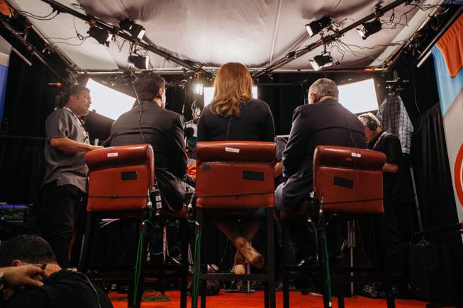 Left, Mark Cuban, Erin Burnett, and Rudy Giuliani speak on CNN inside the spin room at Thomas and Mack Center in Las Vegas, Nev. prior to the third presidential debate on Oct. 17, 2016.