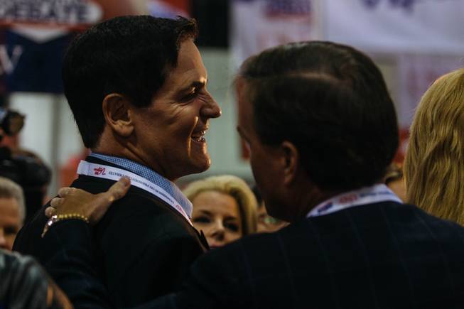 Mark Cuban speaks with media inside the spin room at Thomas and Mack Center in Las Vegas, Nev. prior to the third presidential debate on Oct. 17, 2016.