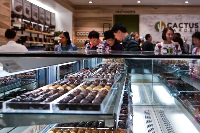 Customers can create their own boxes of chocolates from a large selection on display at the Ethel M Chocolates store which is newly renovated and open on Thursday, Oct. 20, 2016.