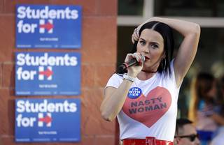 Singer Katy Perry speaks at a rally in support of Democratic presidential nominee Hillary Clinton, Saturday, Oct. 22, 2016, in Las Vegas.