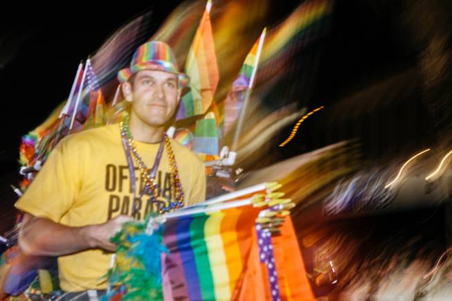 A man sells merchandise at the 18th Annual Pride Parade in Downtown Las Vegas on Oct. 21, 2016.