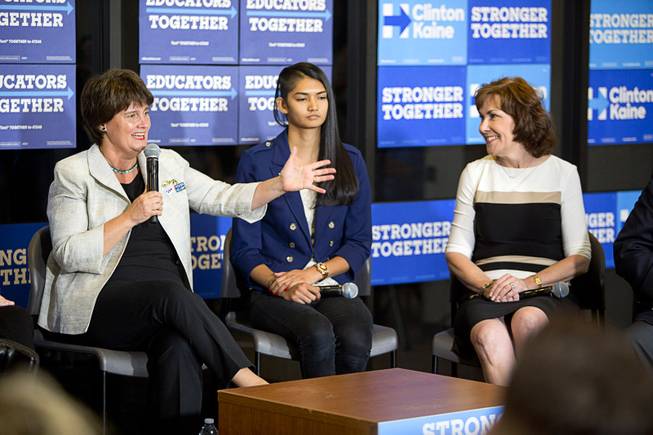 Anne Holton, left, wife of Democratic Vice Presidential candidate Tim Kaine, speaks during an Education roundtable discussion at Nevada State College in Henderson Tuesday, Oct. 25, 2016. With Holton is Desiree DeCosta, center, NSC student body president, and Jacky Rosen, Democratic candidate for Congress.