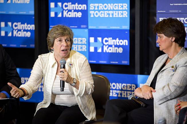 Randi Weingarten, left, president of the American Federation of Teachers, speaks during an Education roundtable discussion at Nevada State College in Henderson Tuesday, Oct. 25, 2016. nne Holton, wife of Democratic Vice Presidential candidate Tim Kaine, listens at right.