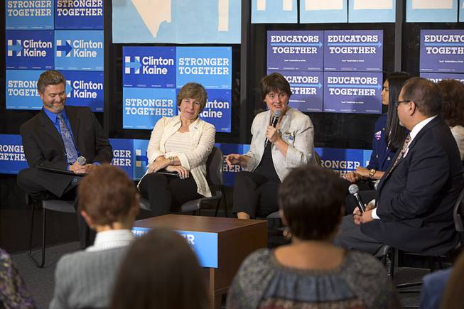 Anne Holton, center, wife of Democratic Vice Presidential candidate Tim Kaine, speaks during an Education roundtable discussion at Nevada State College in Henderson Tuesday, Oct. 25, 2016. Listening at left are: Michael Thorsteinson, a teacher at Basic High School, and Randi Weingarten, president of the American Federation of Teachers.