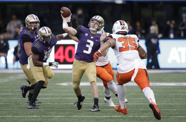 Washington quarterback Jake Browning in action against Oregon State in an NCAA college football game Saturday, Oct. 22, 2016, in Seattle. 