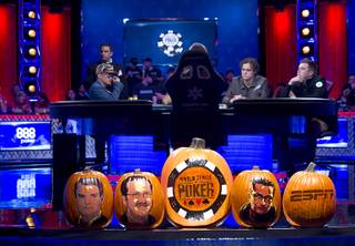 Halloween pumpkins decorate the stage during the World Series of Poker Main Event at the Rio Monday, Oct. 31, 2016.