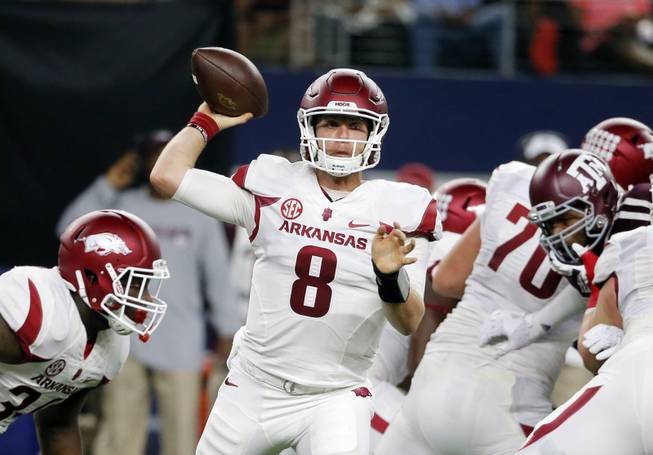 In this Sept. 24, 2016, file photo, Arkansas quarterback Austin Allen (8) throws a pass during the first half of an NCAA college football game against Texas A&M in Arlington, Texas. Allen has quickly established himself as one of the top quarterbacks in the Southeastern Conference in his first season as the starter. 